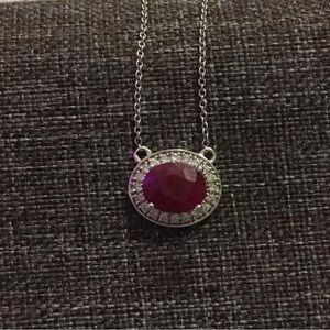 Heera Moti- oval cut ruby and round diamonds necklace.